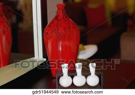 Close-up of showpieces on a sideboard View Large Photo Image Stock Photo - Close-up of showpieces on a sideboard. Fotosearch