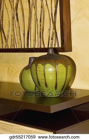 Close-up of showpieces on a sideboard View Large Photo Image Stock Photo - Close-up of showpieces on a sideboard. Fotosearch