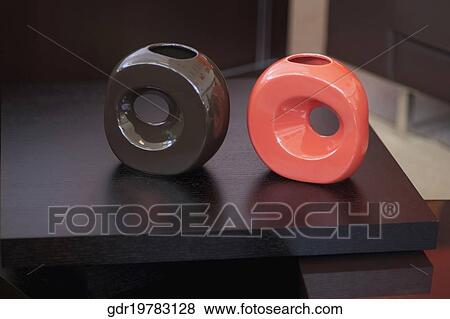 Close-up of showpieces on a table View Large Photo Image Stock Photo - Close-up of showpieces on a table. Fotosearch
