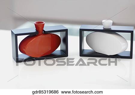 Close-up of showpieces on a table View Large Photo Image Stock Photograph - Close-up of showpieces on a table. Fotosearch