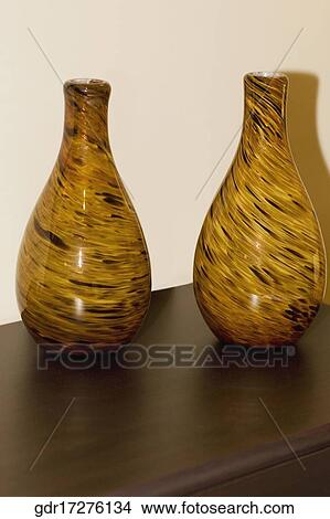 Picture - Close-up of vases on a sideboard. Fotosearch