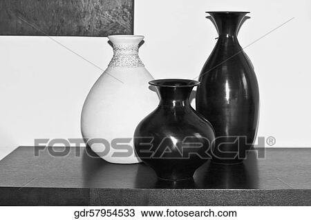 Close-up of vases on a sideboard View Large Photo Image Stock Image - Close-up of vases on a sideboard. Fotosearch
