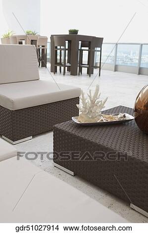 Couch in the balcony of a house View Large Photo Image Picture - Couch in the balcony of a house. Fotosearch