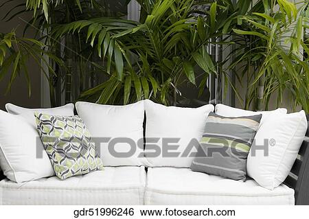 Couch on the porch of a house View Large Photo Image Stock Photograph - Couch on the porch of a house. Fotosearch