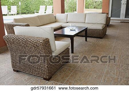 Couches in the porch of a house View Large Photo Image Stock Image - Couches in the porch of a house. Fotosearch
