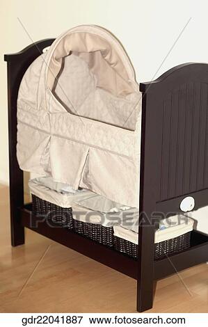 Stock Photo - Crib in a room. Fotosearch