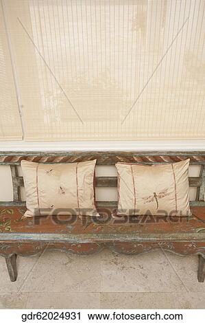 Cushions on a bench View Large Photo Image Stock Image - Cushions on a bench. Fotosearch