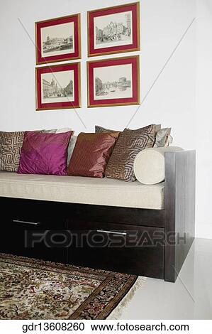 Stock Image - Cushions on a couch in a living room. Fotosearch
