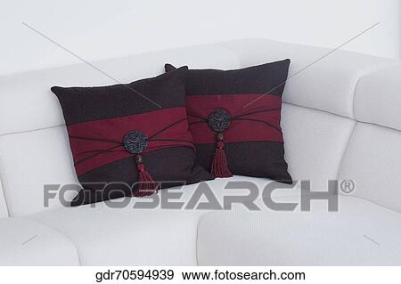 Cushions on a couch in a living room View Large Photo Image Stock Photo - Cushions on a couch in a living room. Fotosearch