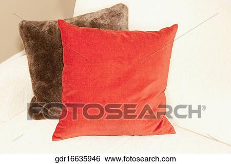 Cushions on a couch in the living room View Large Photo Image Stock Photograph - Cushions on a couch in the living room. Fotosearch