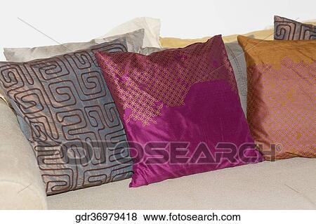 Cushions on a couch View Large Photo Image Stock Photo - Cushions on a couch. Fotosearch