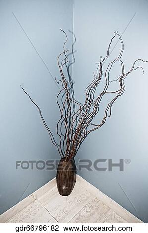 Stock Image - Decorative urn in the corner. Fotosearch