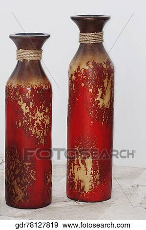 Decorative urns in a living room View Large Photo Image Stock Photo - Decorative urns in a living room. Fotosearch