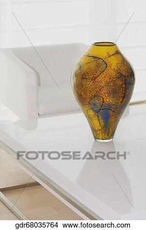 Picture - Decorative urns on a table. Fotosearch