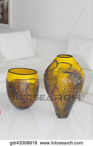 Decorative urns on a table View Large Photo Image Stock Photo - Decorative urns on a table. Fotosearch