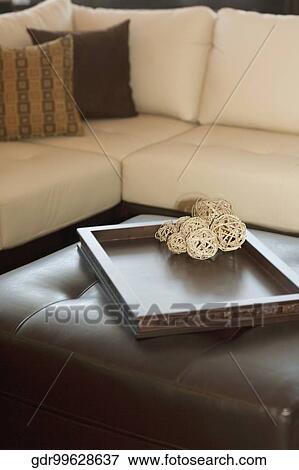Decorative wicker balls on a table in a living room View Large Photo Image Stock Photo - Decorative wicker balls on a table in a living room. Fotosearch