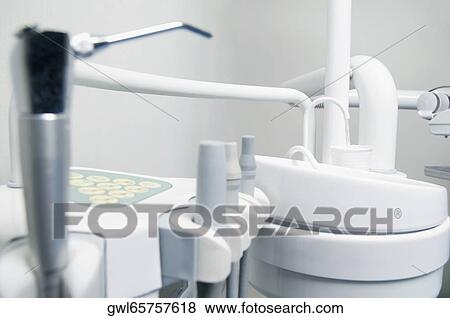 Stock Photo - Dental equipments in an examination room. Fotosearch