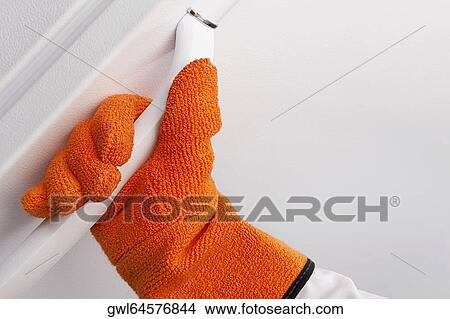 Doctor holding the handle of a refrigerator in a lab View Large Photo Image Picture - Doctor holding the handle of a refrigerator in a lab. Fotosearch
