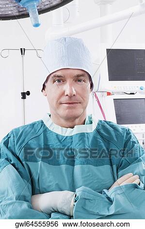 Doctor with his arms crossed View Large Photo Image Stock Photograph - Doctor with his arms crossed. Fotosearch