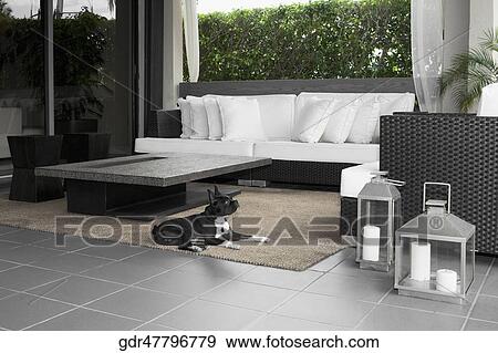 Dog resting in the living room View Large Photo Image Stock Photo - Dog resting in the living room. Fotosearch
