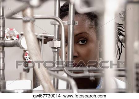 Female doctor researching in a laboratory View Large Photo Image Picture - Female doctor researching in a laboratory. Fotosearch