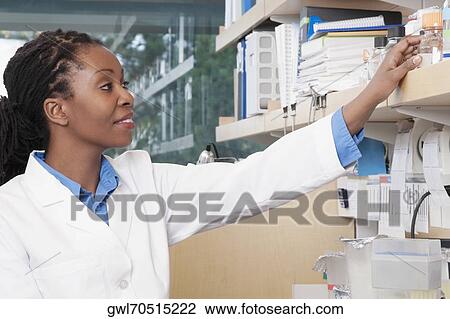 Female doctor working in a laboratory View Large Photo Image Stock Image - Female doctor working in a laboratory. Fotosearch