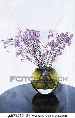 Flower pot on a table in the living room View Large Photo Image Picture - Flower pot on a table in the living room. Fotosearch