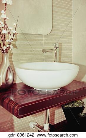 Flower vase near a sink View Large Photo Image Stock Image - Flower vase near a sink. Fotosearch