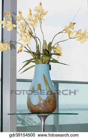 Flower vase on a stand View Large Photo Image Stock Image - Flower vase on a stand. Fotosearch