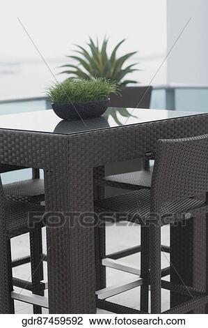 Furniture in the balcony of a house View Large Photo Image Stock Image - Furniture in the balcony of a house. Fotosearch