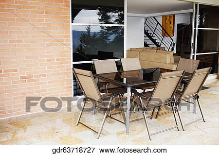 Furniture in the porch of a house View Large Photo Image Stock Photo - Furniture in the porch of a house. Fotosearch
