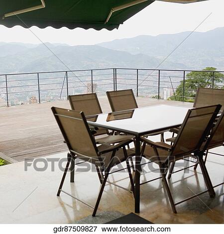 Furniture in the porch of a house View Large Photo Image Stock Photo - Furniture in the porch of a house. Fotosearch