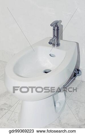 Stock Image - High angle view of a bathroom sink. Fotosearch