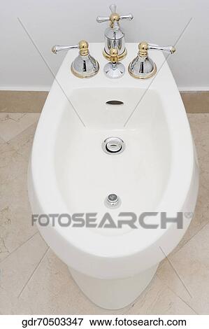 Stock Photo - High angle view of a bathroom sink. Fotosearch