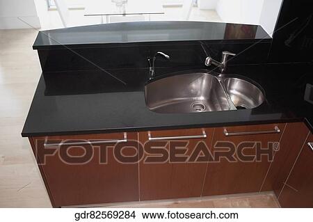 High angle view of a kitchen sink View Large Photo Image Picture - High angle view of a kitchen sink. Fotosearch