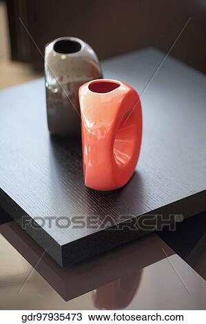 High angle view of showpieces on a table View Large Photo Image Stock Image - High angle view of showpieces on a table. Fotosearch