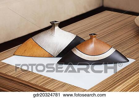 Incense stick holders on a table View Large Photo Image Stock Image - Incense stick holders on a table. Fotosearch