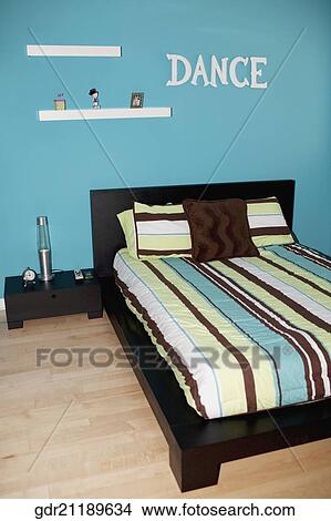 Interiors of a bedroom View Large Photo Image Picture - Interiors of a bedroom. Fotosearch