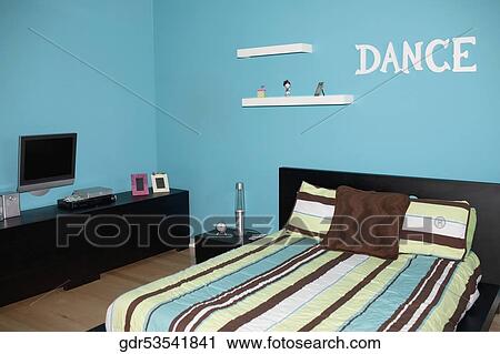 Stock Image - Interiors of a bedroom. Fotosearch