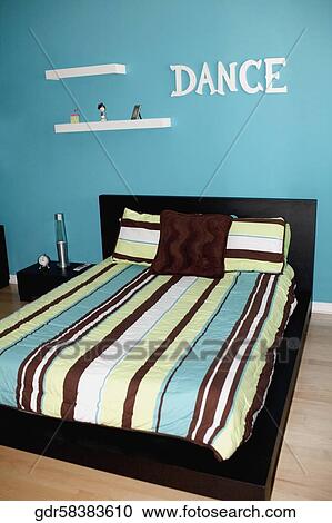 Stock Image - Interiors of a bedroom. Fotosearch