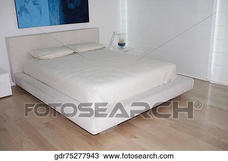 Stock Image - Interiors of a bedroom. Fotosearch