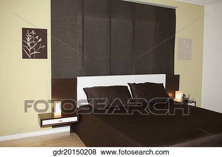 Interiors of a bedroom View Large Photo Image Stock Photo - Interiors of a bedroom. Fotosearch