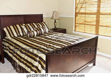 Interiors of a bedroom View Large Photo Image Stock Photo - Interiors of a bedroom. Fotosearch