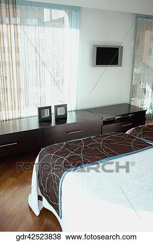 Interiors of a bedroom View Large Photo Image Stock Photo - Interiors of a bedroom. Fotosearch