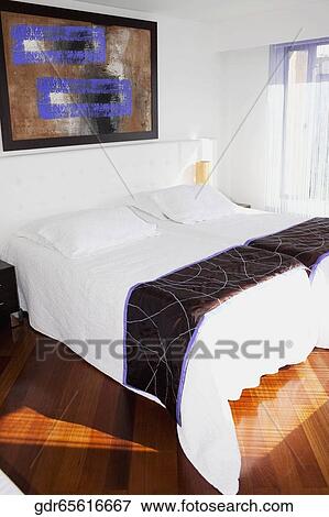 Stock Photo - Interiors of a bedroom. Fotosearch