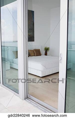 Interiors of a bedroom View Large Photo Image Stock Photograph - Interiors of a bedroom. Fotosearch
