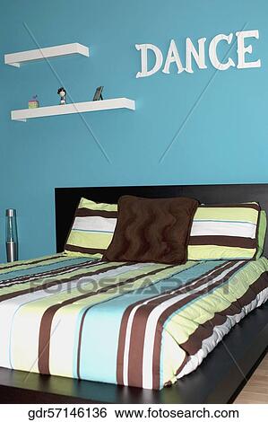 Interiors of a bedroom View Large Photo Image Stock Photograph - Interiors of a bedroom. Fotosearch