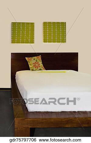 Interiors of a bedroom View Large Photo Image Stock Photograph - Interiors of a bedroom. Fotosearch