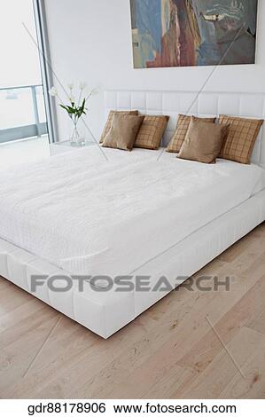 Interiors of a bedroom View Large Photo Image Stock Photograph - Interiors of a bedroom. Fotosearch
