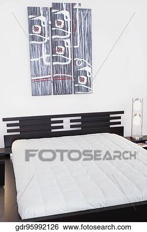 Interiors of a bedroom View Large Photo Image Stock Photograph - Interiors of a bedroom. Fotosearch